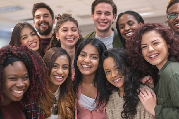 istock Multi-Ethnic Group of University Students Sitting Inside Together 1167863773