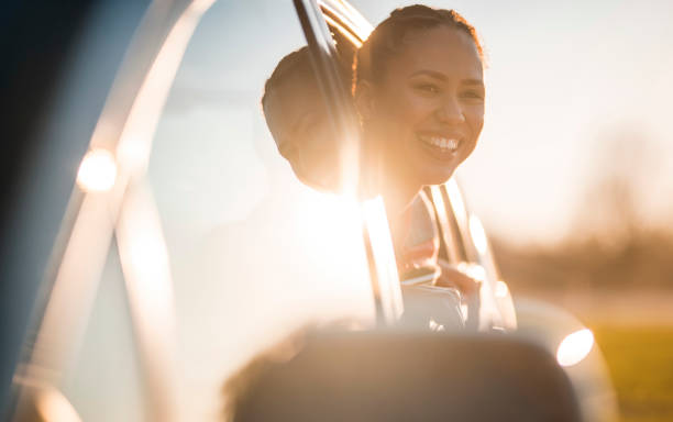 istock Woman looking out from the car 1167863797