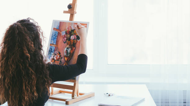 istock creativity inspiration lady still life painting 1167863922