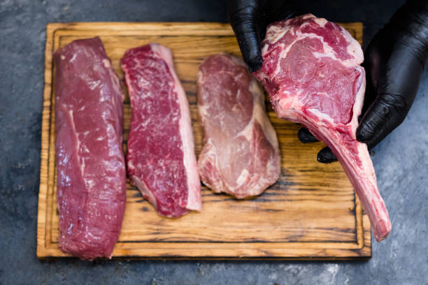 istock steakhouse kitchen raw beef meat chef steaks 1167863972