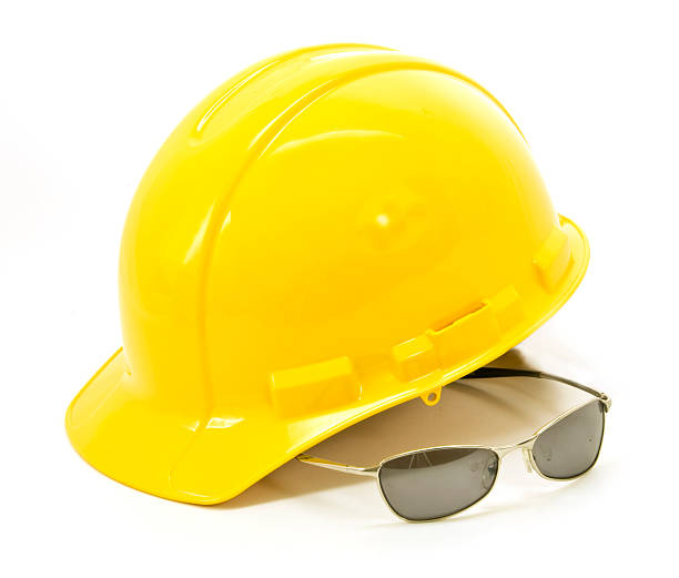istock Yellow Hardhat and Tinted Safety Glasses - Isolated on White 116786866