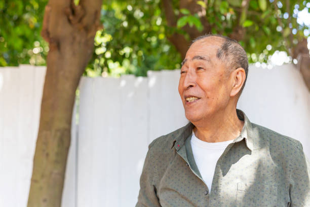 istock Happy Asian Senior Man in His Backyard 1167869766