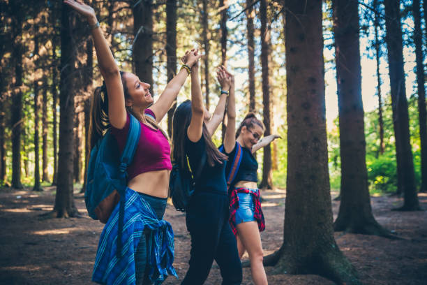 istock Cheerful women in forest. 1167870800
