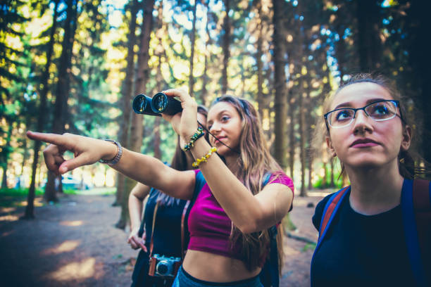 istock Friends in forest on the right way. 1167870879