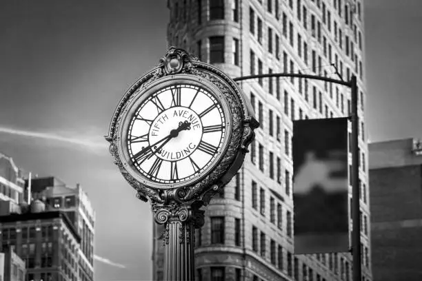 5th Avenue, Flatiron Building clock Manhattan, NYC. USA. August 12, 2019