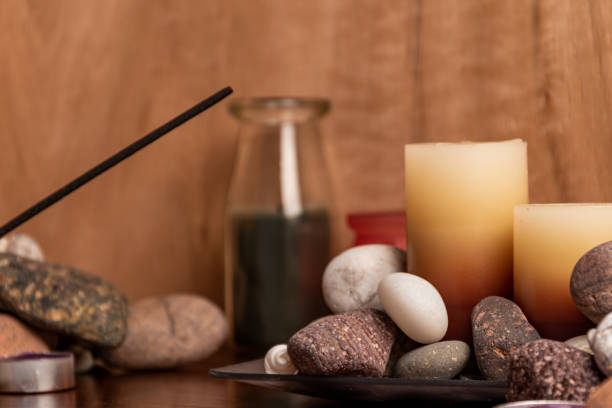 istock scented candles and energetic stones 1167880092