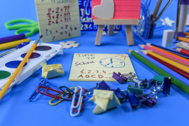 istock Back to school supplies on a blue background 1167881548