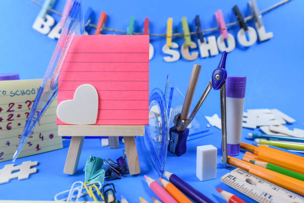 istock Back to school supplies on a blue background 1167881555