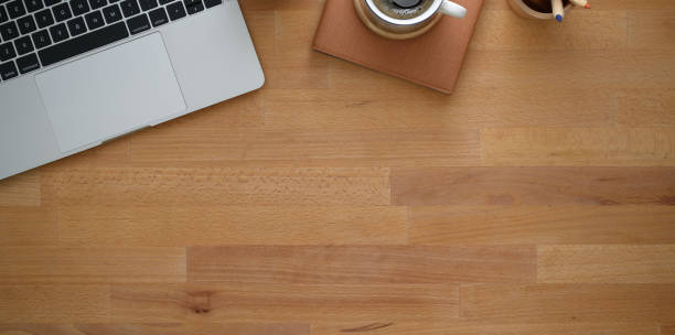 istock Overhead shot of creative workplace with laptop and copy 1167882118