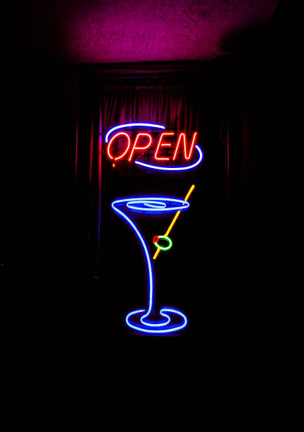 istock Open Sign with Cocktail Glass with Olive 1167883098