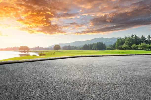 istock Empty road and green woods with mountain nature landscape 1167884223