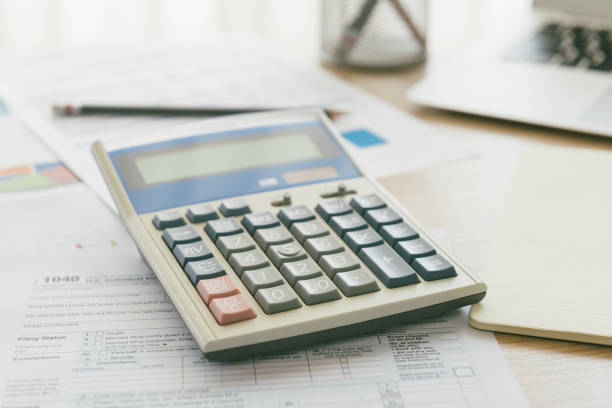istock Calculator on the desk 1167884265