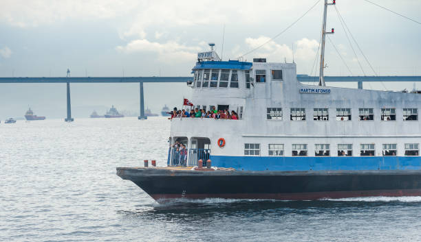 Rio de Janeiro, Brazil - August 17 2013: Ferry and passengers mostly Brazilian workers from Rio de Janeiro to Niteroi