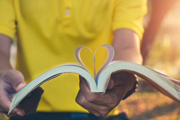 istock Men read books in quiet nature, Concept read a books. 1167887102