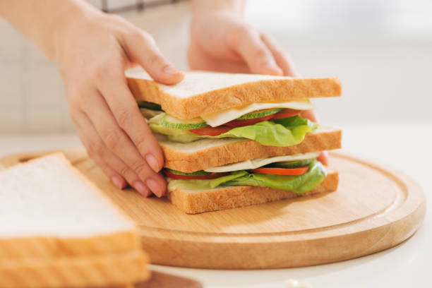 istock Back to school. Person making healthy lunch box 1167888876