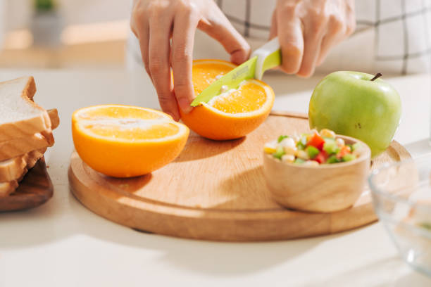 istock Mother preparing school lunch for childrens in home kitchen 1167888953