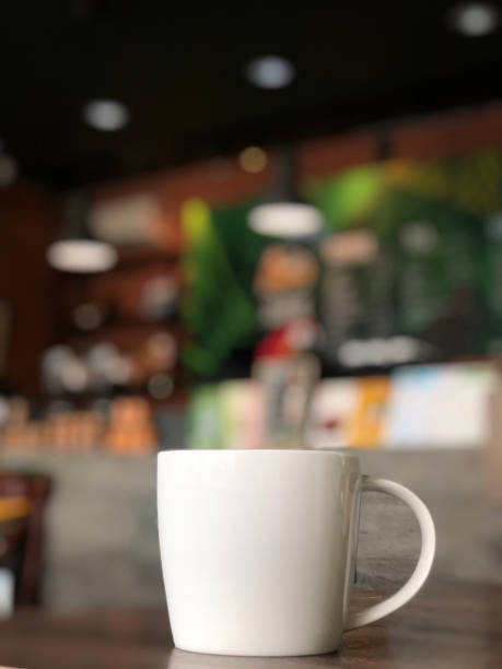 istock white coffee mug on the table in the cafe shop 1167892310