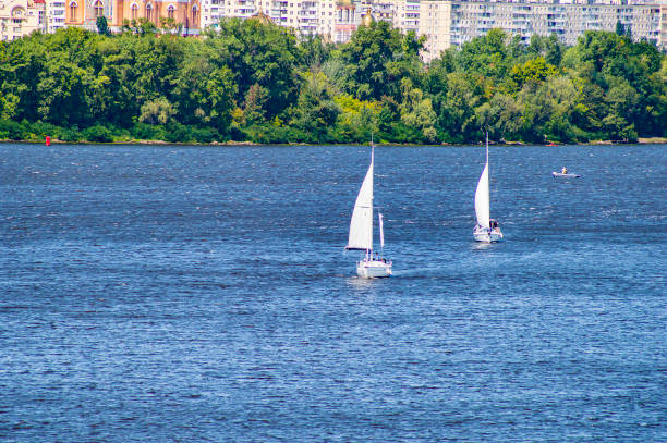 istock Sailing yacht sailing with an open white sail. 1167896212