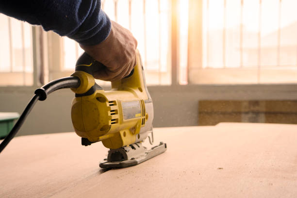 istock Close-up of a carpenter using a Electric saw. 1167900107