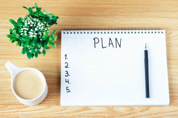 istock Inscription Plan in notepad, close-up, top view, concept of planning, goal setting 1167904015