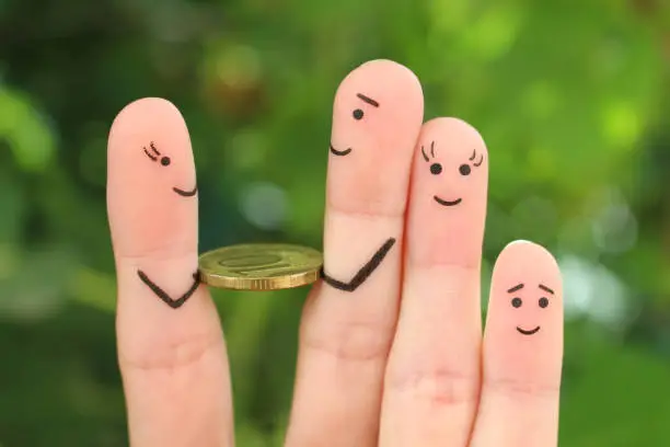 Photo of Fingers art of happy family. Man is given money.