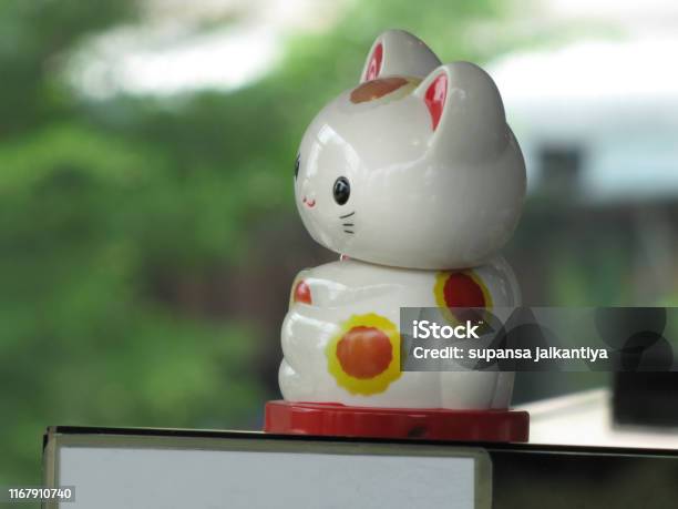 White Cat Toy Brings Good Luck Stock Photo - Download Image Now - Animal, Art, Beauty