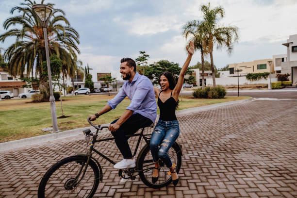 istock Millennial friends riding bicycles 1167912884