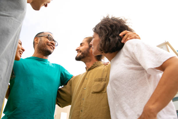 istock Cheerful excited close friends hanging out and hugging 1167917101