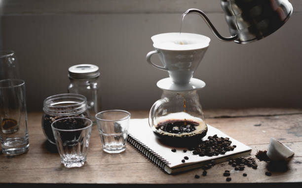 istock Drip Coffee Black coffee brewed in low light in the house 1167917175
