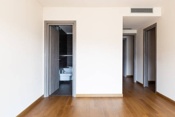 istock Front view of room with parquet and private bathroom access 1167925775
