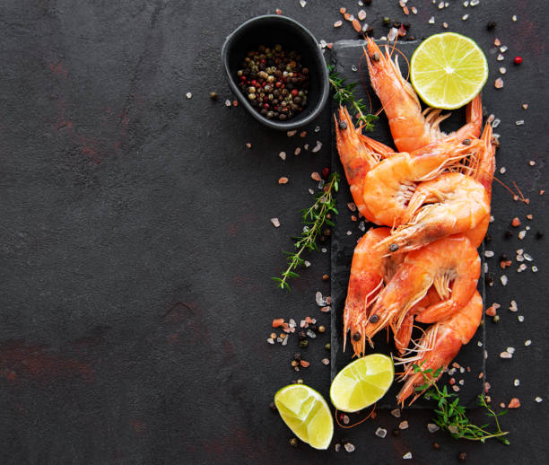 istock Shrimps or prawns served with lemon 1167928399