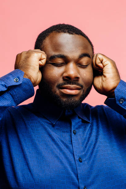 istock Portrait of a man in with hands on head 1167929732