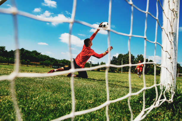 istock Teenagers playing soccer 1167931261