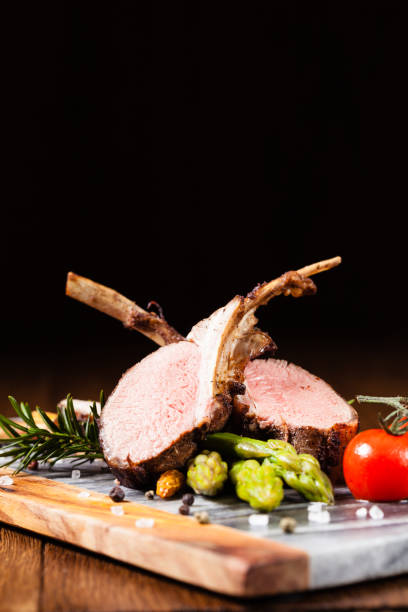 istock Baked lamb loin, served with asparagus. 1167931272