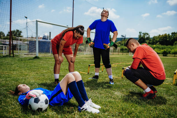 istock Teenagers resting after playing soccer 1167931470