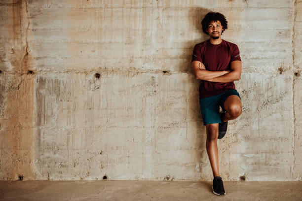 istock Smiling millennial sports man looking at camera 1167931557