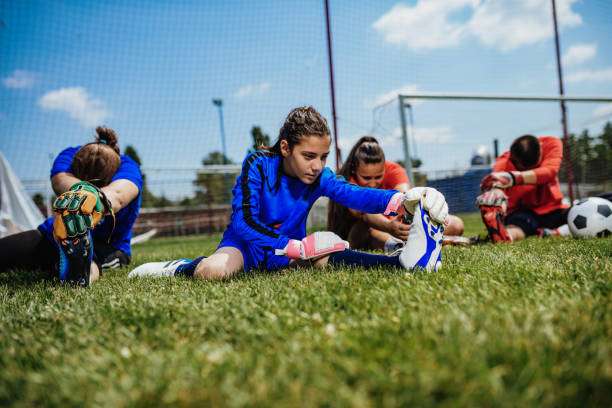Teenager stretching before the soccer game