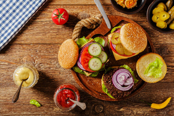 istock Homemade, beef hamburger with cheese and vegetables. 1167931845