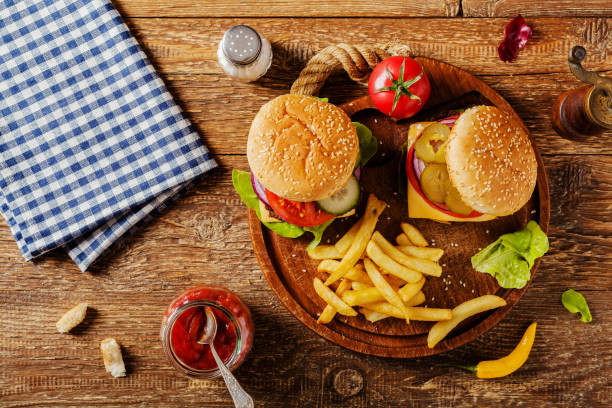 istock Homemade, beef hamburger with cheese and vegetables. 1167931875