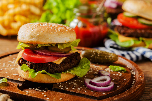 istock Homemade, beef hamburger with cheese and vegetables. 1167931905