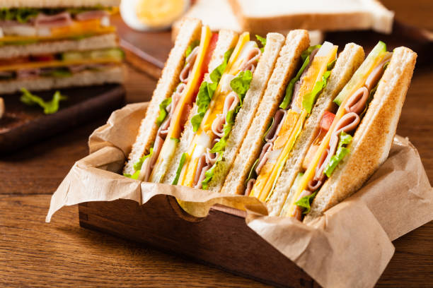 istock Delicious toast sandwich with ham, cheese, egg and vegetables. 1167931931