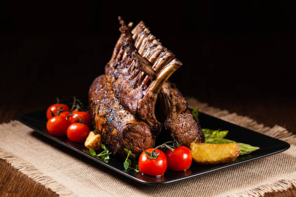 istock Baked lamb loin, served with asparagus. 1167933983
