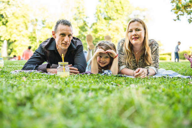 istock Happy family at the park 1167934953