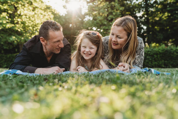istock Happy family at the park 1167934985