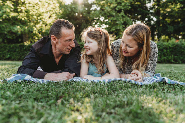 istock Happy family at the park 1167935004