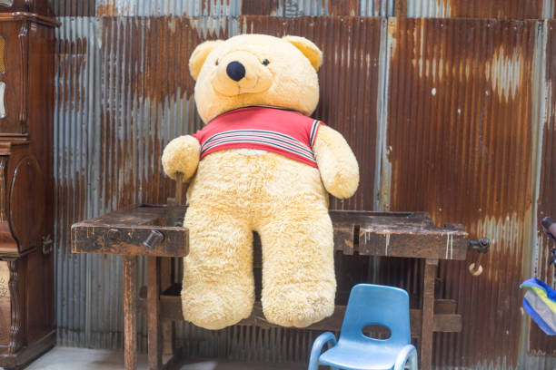 istock Brown teddy bear on vintage background. 1167936206