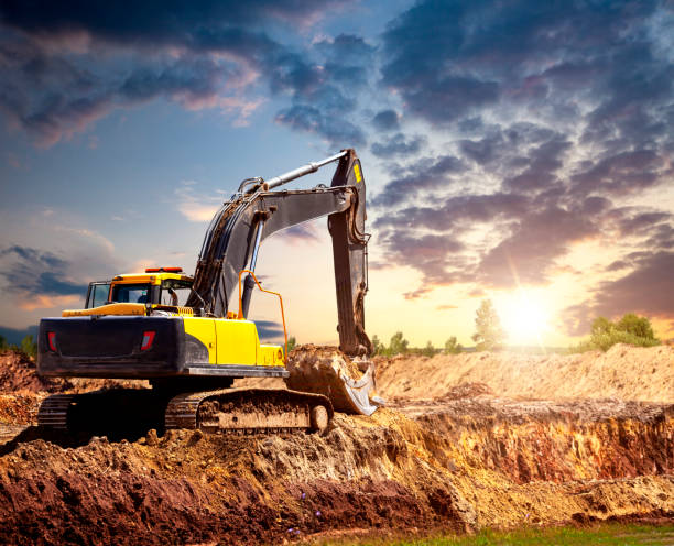 istock Excavator at the construction site in the evening. 1167938954