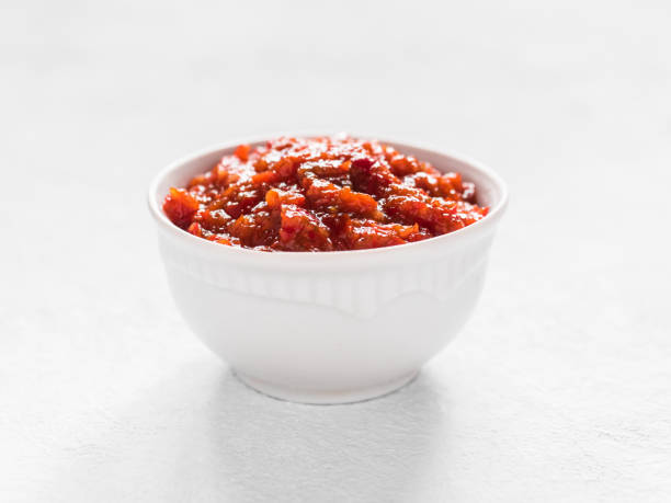 istock Gochujang. Traditional Korean soybean paste with sticky rice and fermented soybeans, dressed with red pepper in high concentration in a white bowl 1167939007