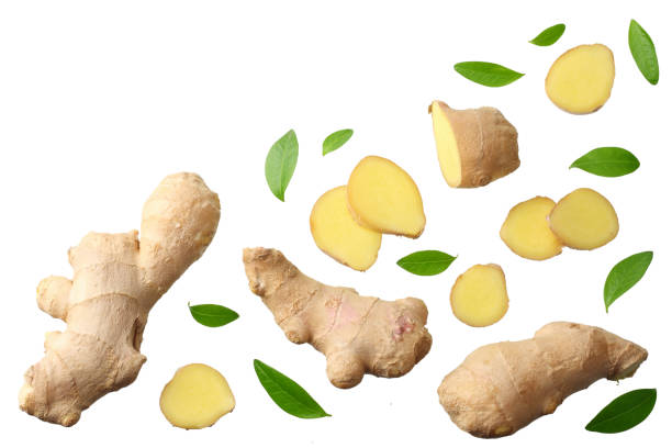 istock sliced ginger with leaves isolated on white background top view 1167942589