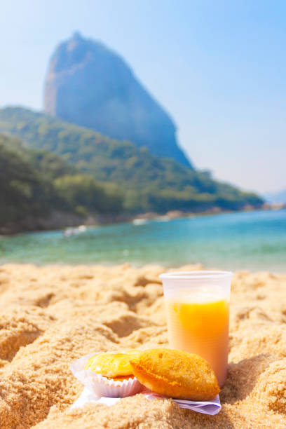 Coxinha, empanadas and juice snack at Sugarloaf Mountain in Rio de Janeiro, Brazil